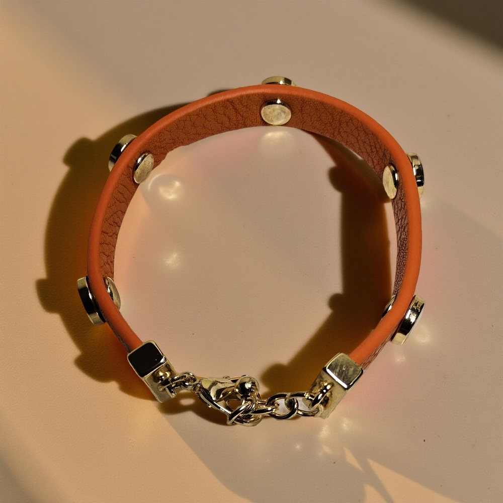 1st & GorgeousOrange faux Leather Bracelet with goldtone Accents
